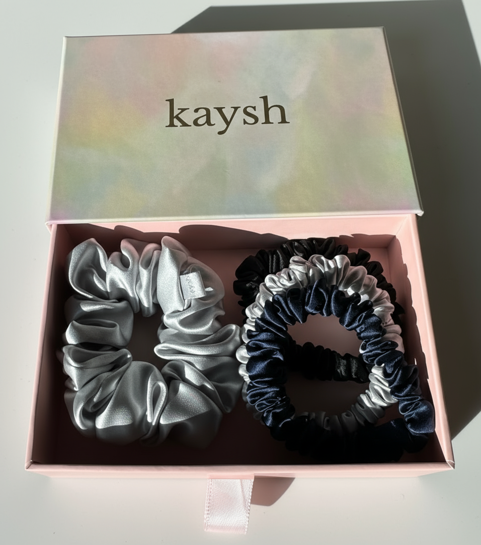 100% mulberry silk scrunchies inside a gift box. Shiny, luxurious and soft to touch. 