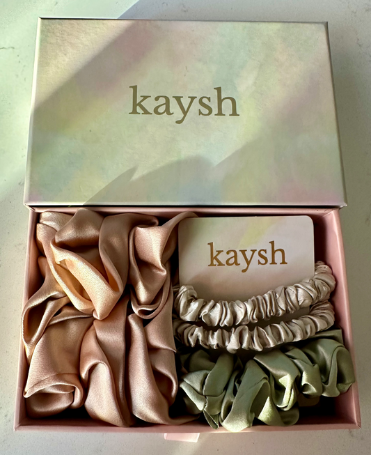 100% mulberry silk scrunchies inside a gift box. Shiny, luxurious and soft to touch. 